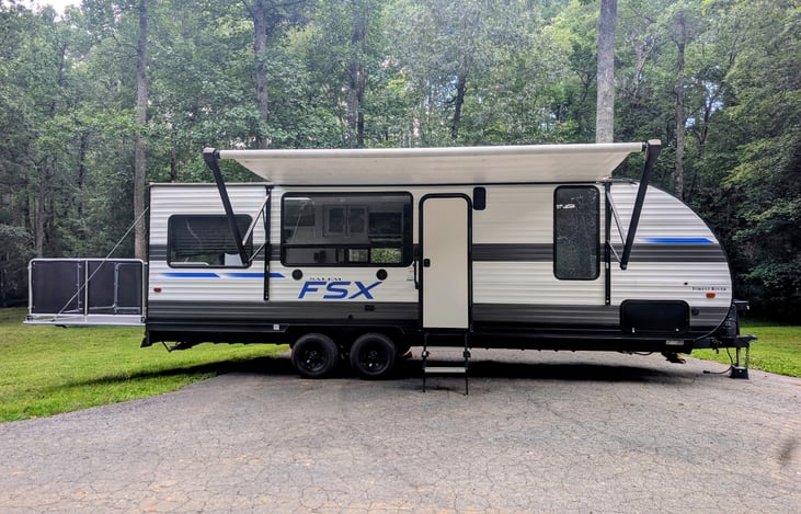 Get ready to elevate your camping! Our 2021 Forest River Salem FSX 260 RT boasts a spacious rear deck – ideal for hauling your toys or enjoying outdoor living.