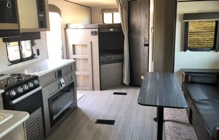 Living area with view of full over full bunks