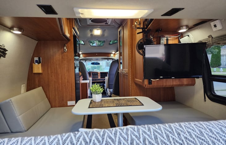 Another table in the rear to entertain or watch TV