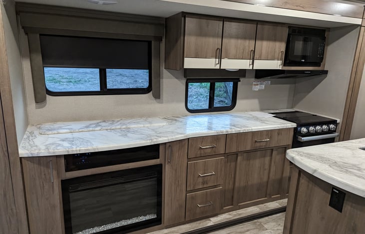 More counter space than you will know what to do with, and with a TV that rises up from the counter, you can watch nature or the big game.