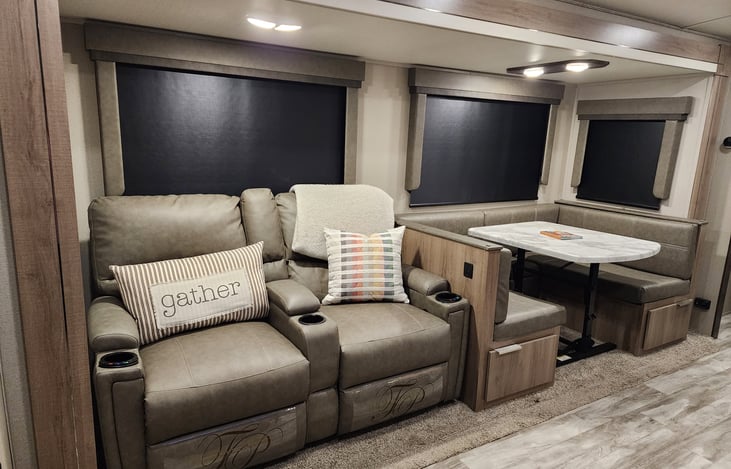 Recliners have heat and massage options. Also high quality blackout shades on every window!