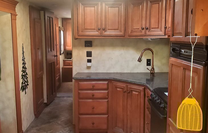 Real wood and granite will make you feel right at home.