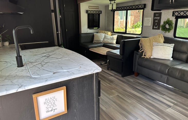 This is where you can sleep up to four and hang out. The table is down in this picture but is a normal height for dining.