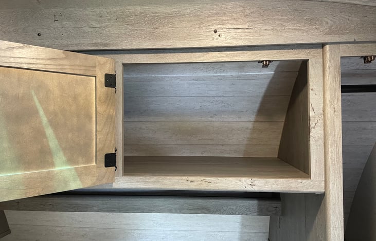 Overheard Storage above Bed