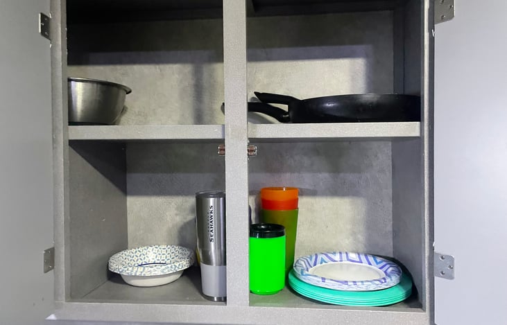 pans, plastic plates and cups and bowls, paper plates and bowls included