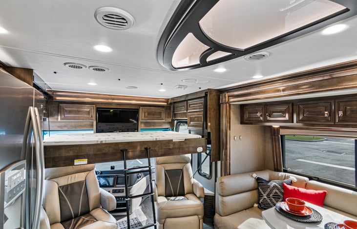 Shows a drop down bed with full size mattress.