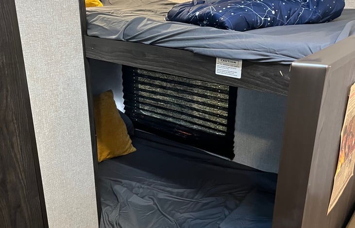 two twin bunks, comes with bedding and pillows needed. Holds up to 300lbs