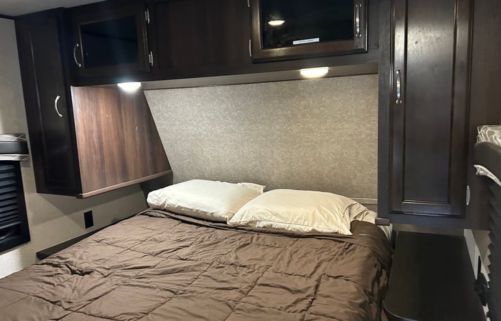 Queen size bed in private bedroom