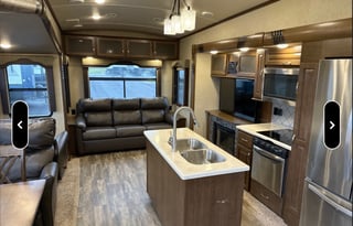 Spacious, stocked, delivered. King w/ pullout sofa