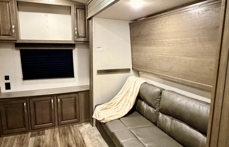 Back bunk room with an additional sitting area