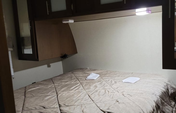 Queen size bed, with Serta mattress.