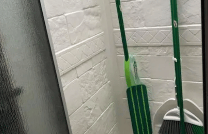 Shower and included cleaning accessories.