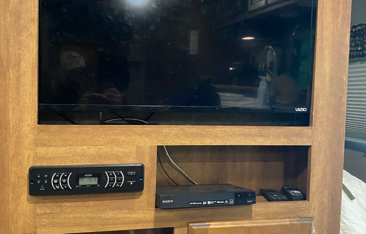 Tv, radio with Bluetooth, blueray player with assortment of dvds