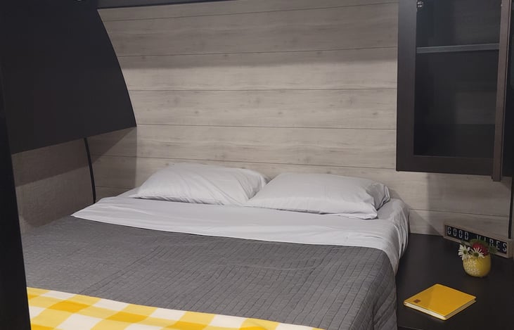 Master bedroom, ample storage with side tables and areas to store and hang clothes.