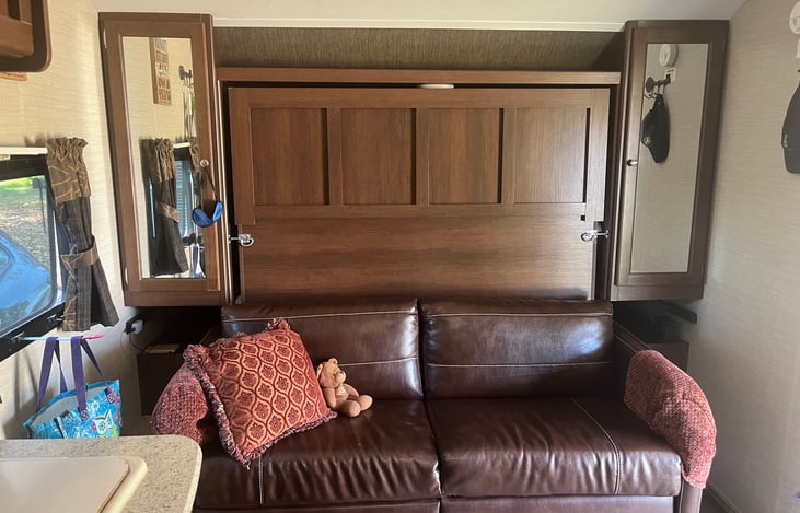 There is a Murphy queen bed behind the sofa, with a 3" memory foam mattress on top, for more comfort