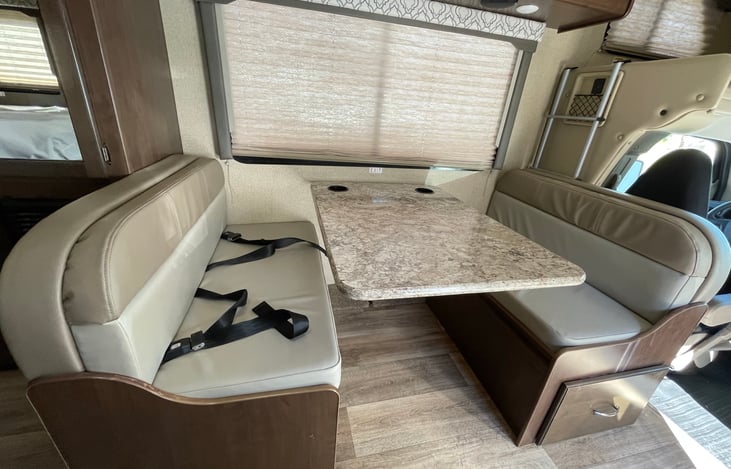 Newly upholstered dinette. Can  seat upto four adults.