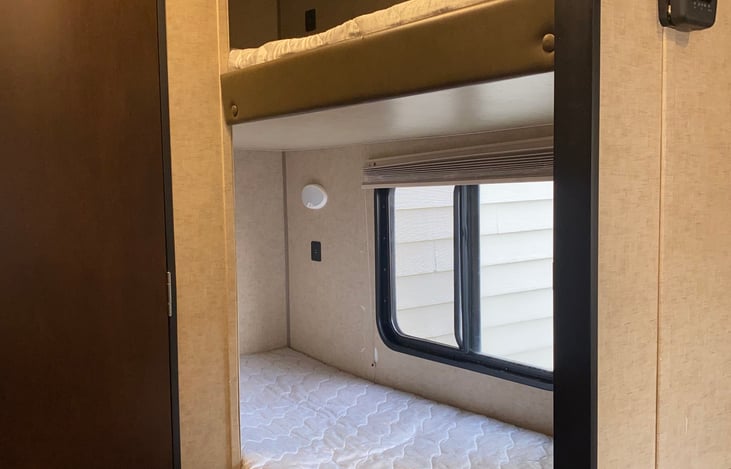 Bunk bed system. Bedding provided