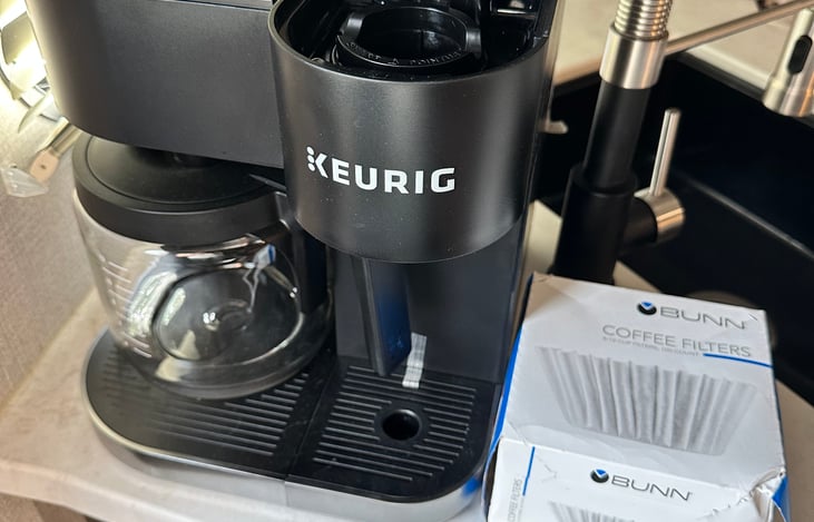 Bring your K-Pods or ground coffee. Brand new Keurig and filters.