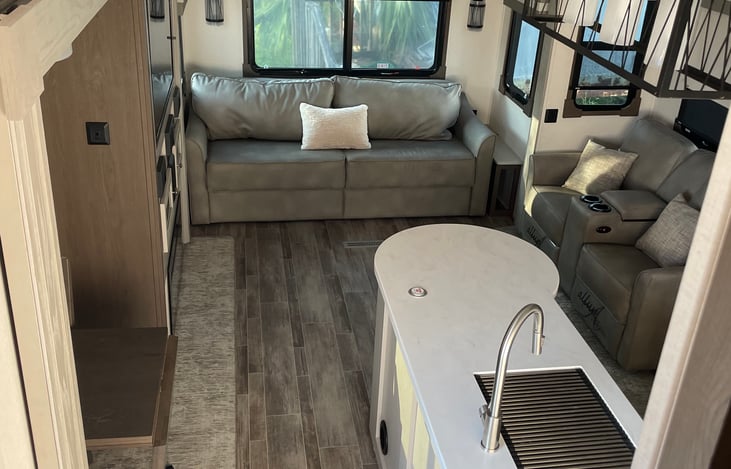 Living room area with small dining table