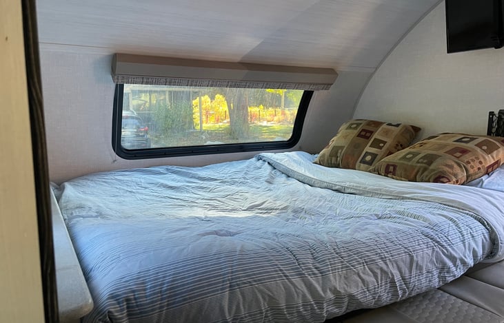 Murphey bed converted into comfey queen bed!  Linen supplied, but bring your own pillows.