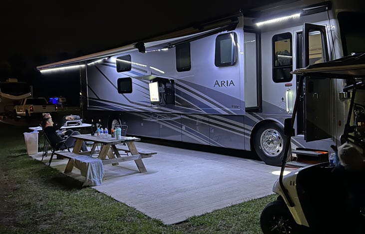 Movie nights under the stars? Yes please! Create your perfect outdoor living room with ambient lighting and all the comforts of home.