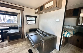 Fully furnished travel trailer for a small family.