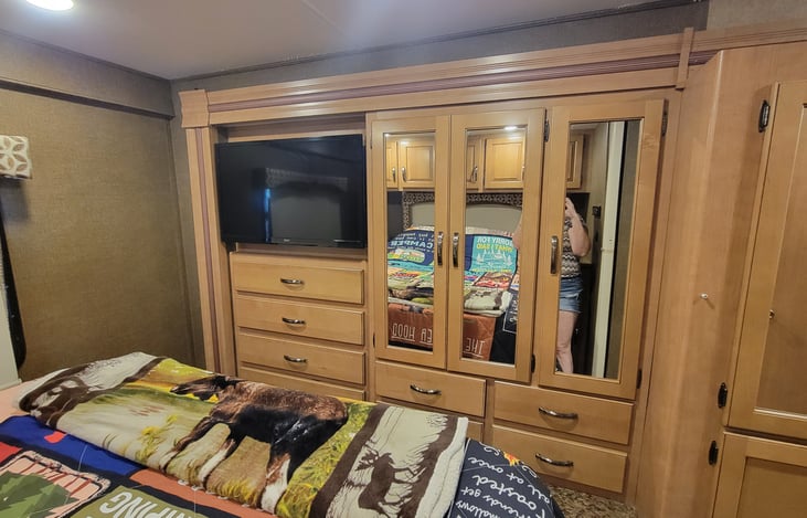 Wait, wait wait, is that a second TV, and EVEN MORE STORAGE? This is too good to be true