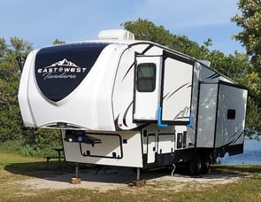 EAST TO WEST Tandara 320RL