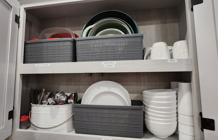 Plenty of plates, bowls, cups, mugs, and silverware included.