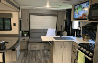 Sporty Little Giant Keystone RV Passport sleeps 7