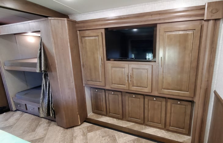 Master bedroom cabinets, next to bunk beds.