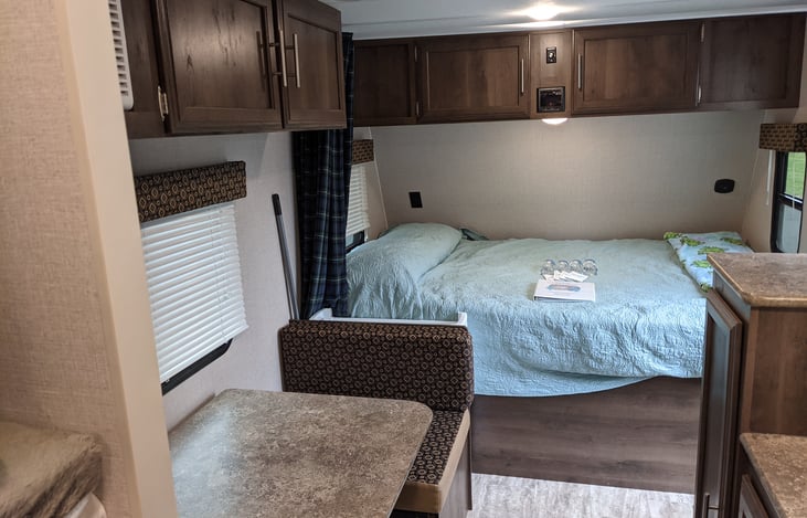 Full size bed with linens provided. Dinette converts into a single bed. Sleeping bag with liner available on request for the dinette bed.