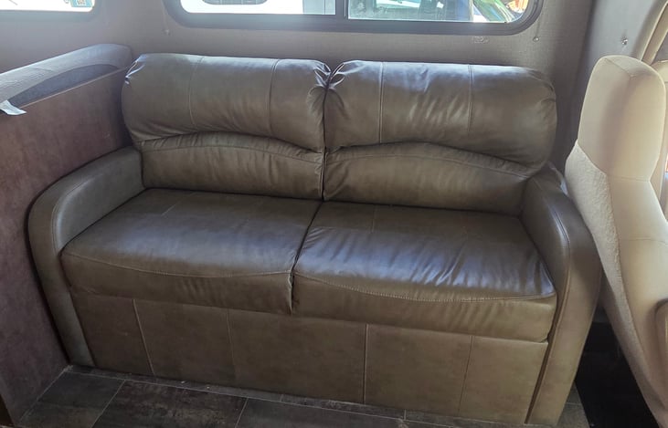 Living Area: sofa that convert into additional sleeping space.