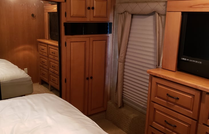 Master bedroom closet with mirror door