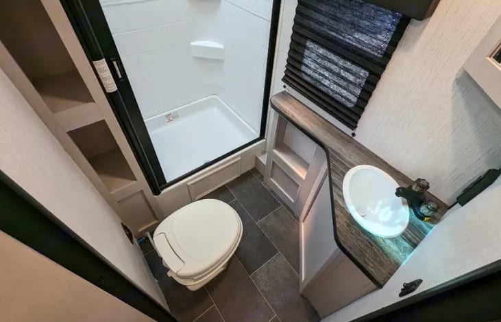 Bathroom, walk-in shower and bathroom sink