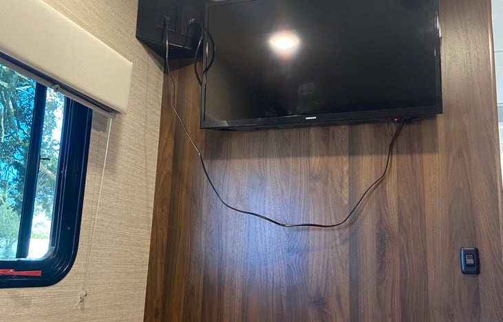 1 of 2 TVs in the RV, this one is located in rear sleeping area