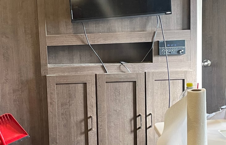 Entertainment center with surround sound. Also includes dvds and dvd player