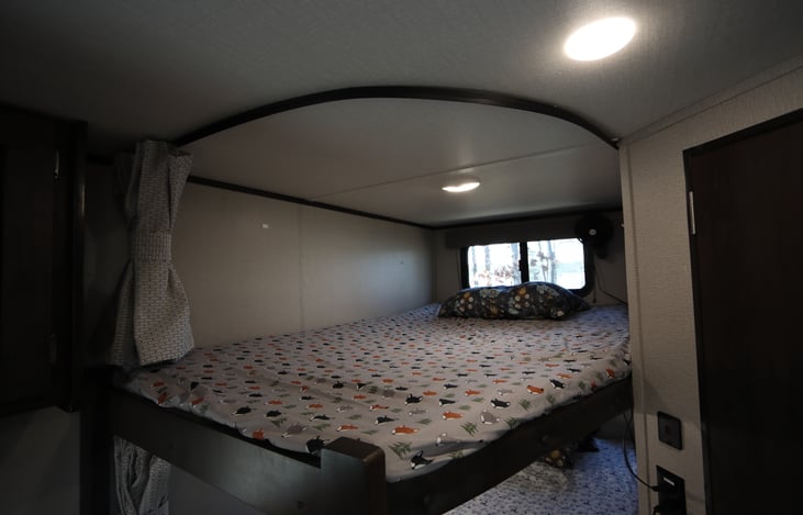 Large Upper Bunk Bed with Operable Window and Privacy Curtain