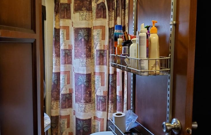 Extra bathroom toiletry and supplies storage.