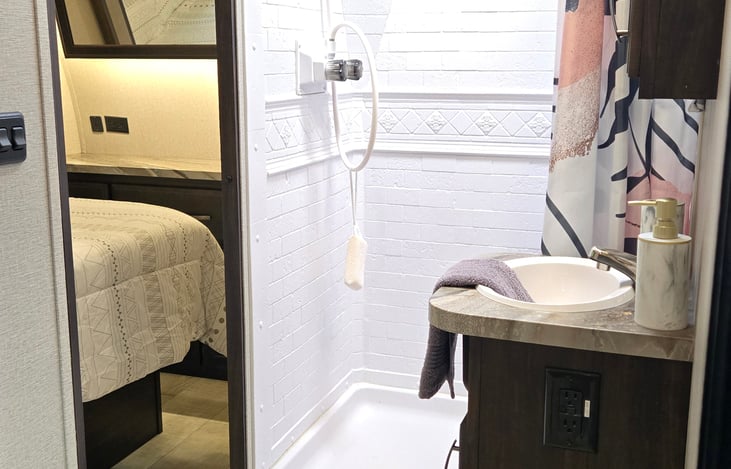 Full bathroom connected to the master bedroom and living area.