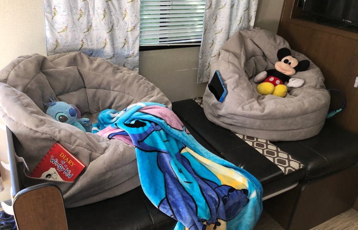 With the table converted to bed mode a couple of provided bean bags is sure to make this your families favorite hang out. Convenient out the way space gives littles a place to be when heading out.