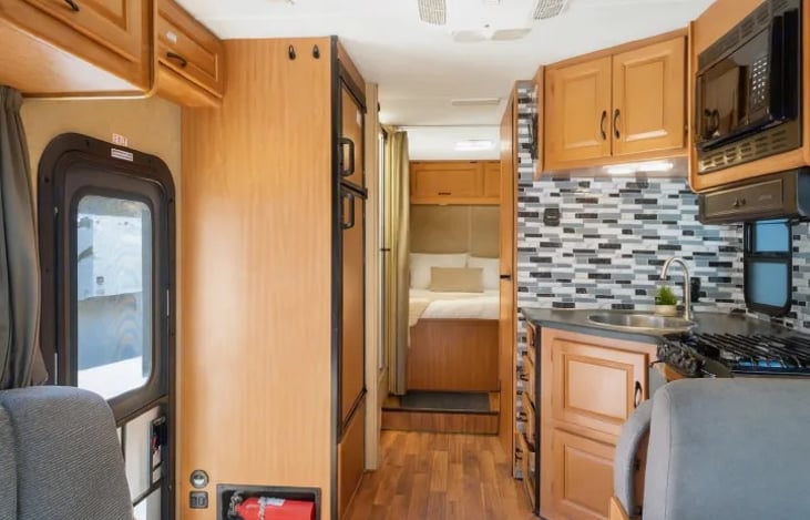 Unwind after the beats at EDC — a peaceful, pet-friendly RV bedroom that sleeps 6 and keeps the good vibes going