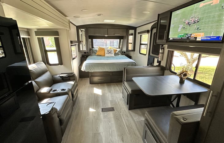 Couples floor plan with seating, dining and sleeping accommodations well placed.