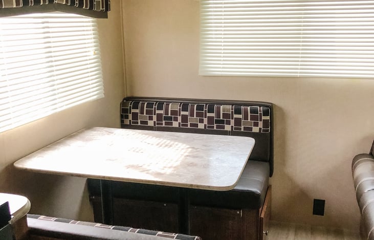 Kitchen table that folds into bed with under seat storage