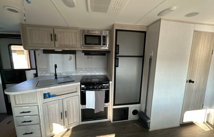 Kitchenette
Left side of interior of trailer. Door is to the bathroom.