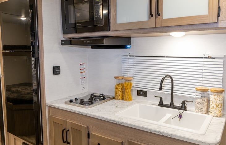 Check under the sink for cleaning supplies! Drawers for cooking utensils, under the stove for cookware. Coffee cups and other dishes in upper cabinet.