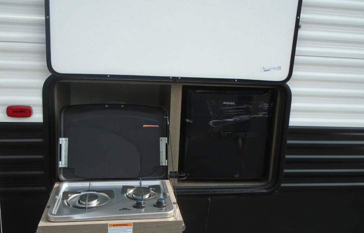 Outside 2 burner stove and refrigerator