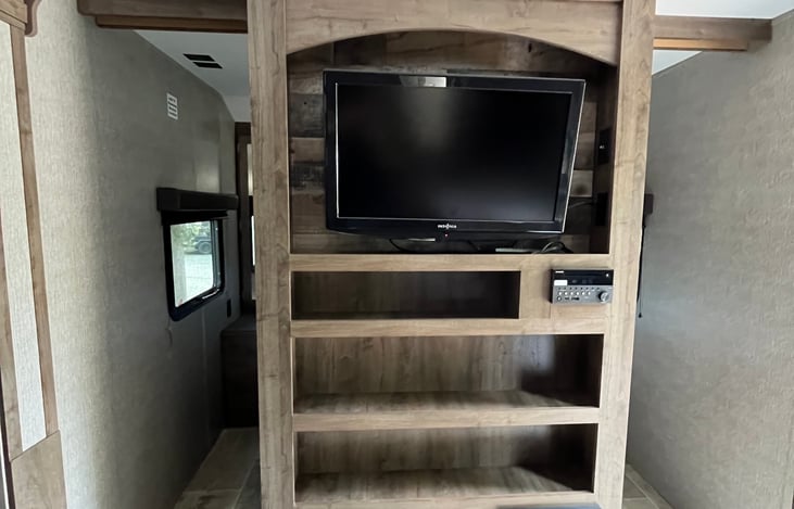 The TV can be  angled for easier viewing. It is not a smart tv, so no streaming. It is connected to a dvd player, so use one of ours or bring your own.