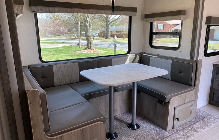 We love this huge window and space. Prop your feet up in the morning with your coffee and overlook your campsite.
