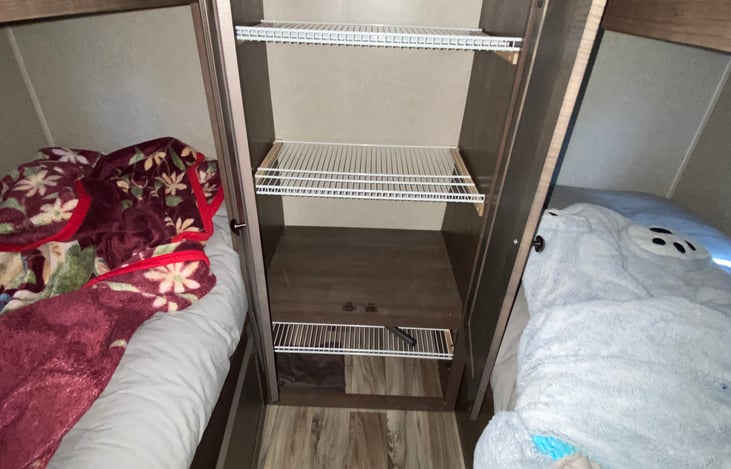 Bunkhouse: storage shelves with lower storage